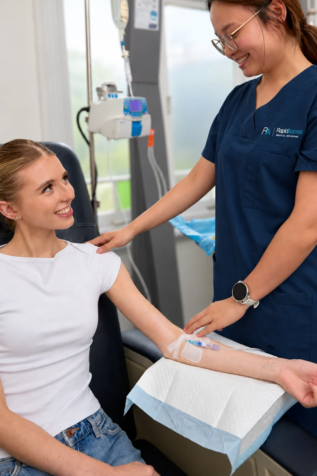 A nurse supporting a seated patient during treatment
